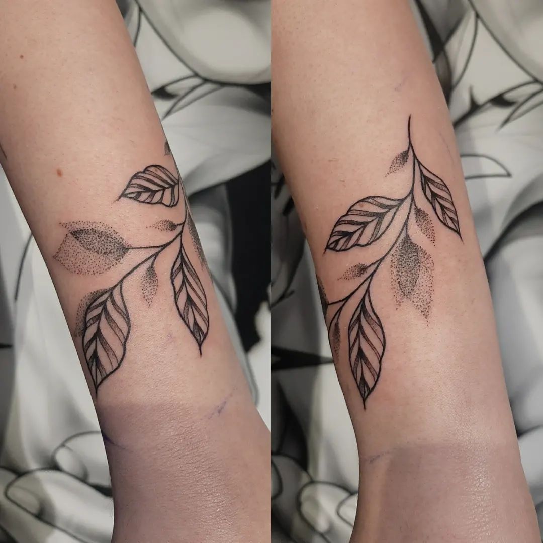  Simple line leaves are for you if you like simplicity in tattoos. Also, some leaves in it are drawn with dots and this is what makes this tattoo adorable. Go for it.