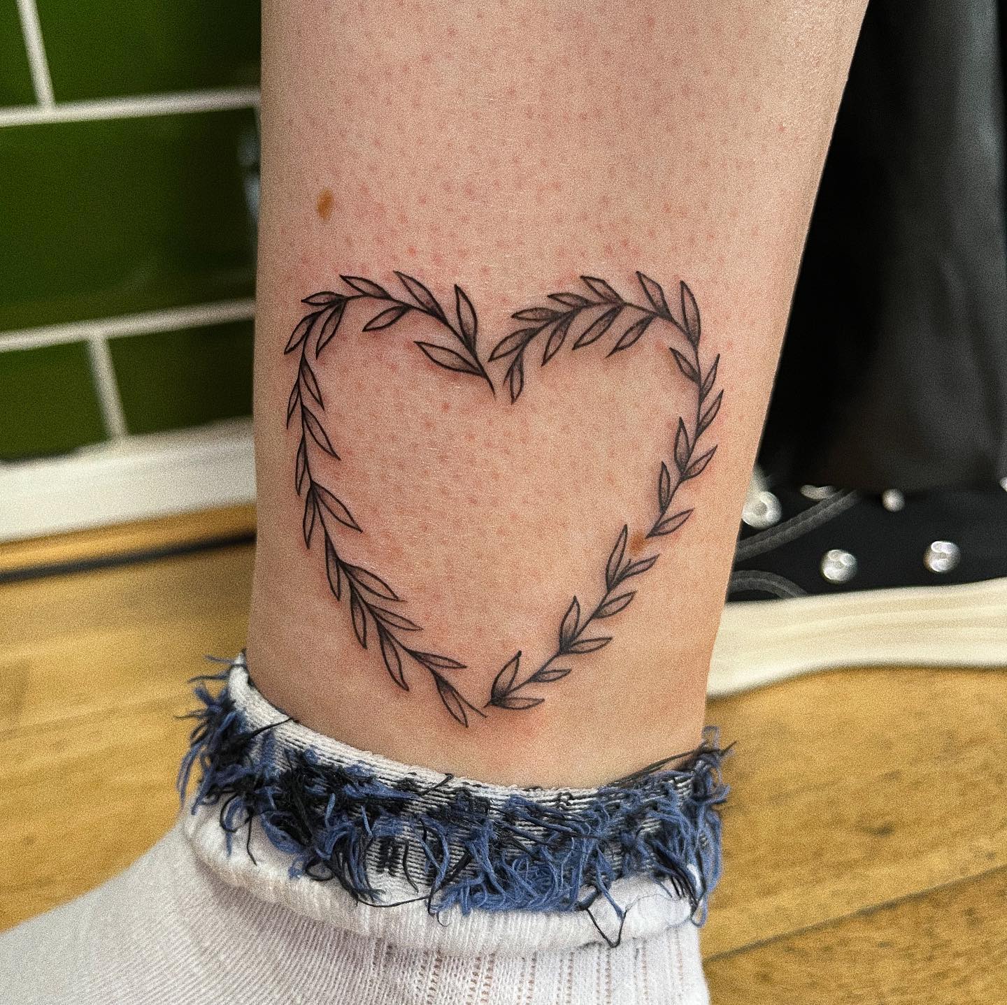 Are you in love with all types of leaves in nature? If your answer is yes, then the heart shaped leaves tattoo above is definitely for you. This will warm your heart.
