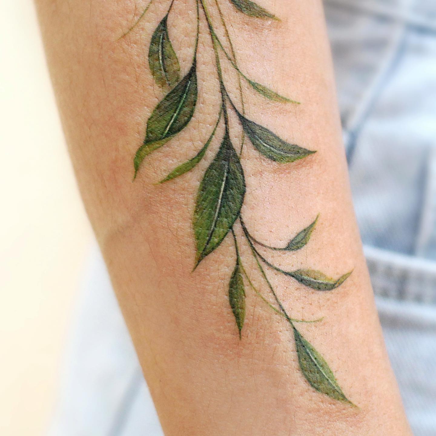 The leaves above look like real, don't they? With its color and special technique used in it, this tattoo can be one of the best realistic tattoos, for sure.