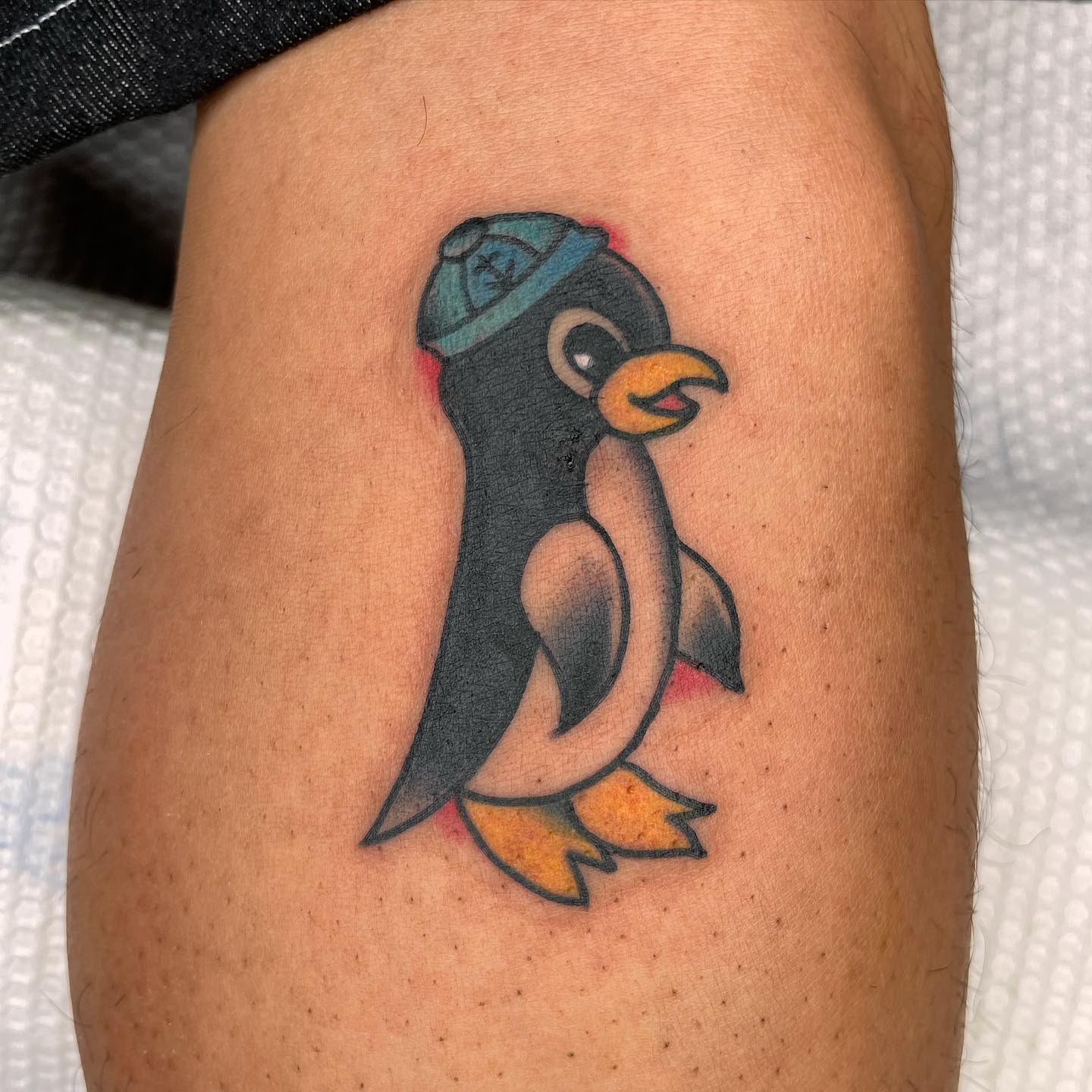 A little and cute sailor penguin is all you need to smile. If the size of this tattoo is too big for you, you can get a smaller one of it.
