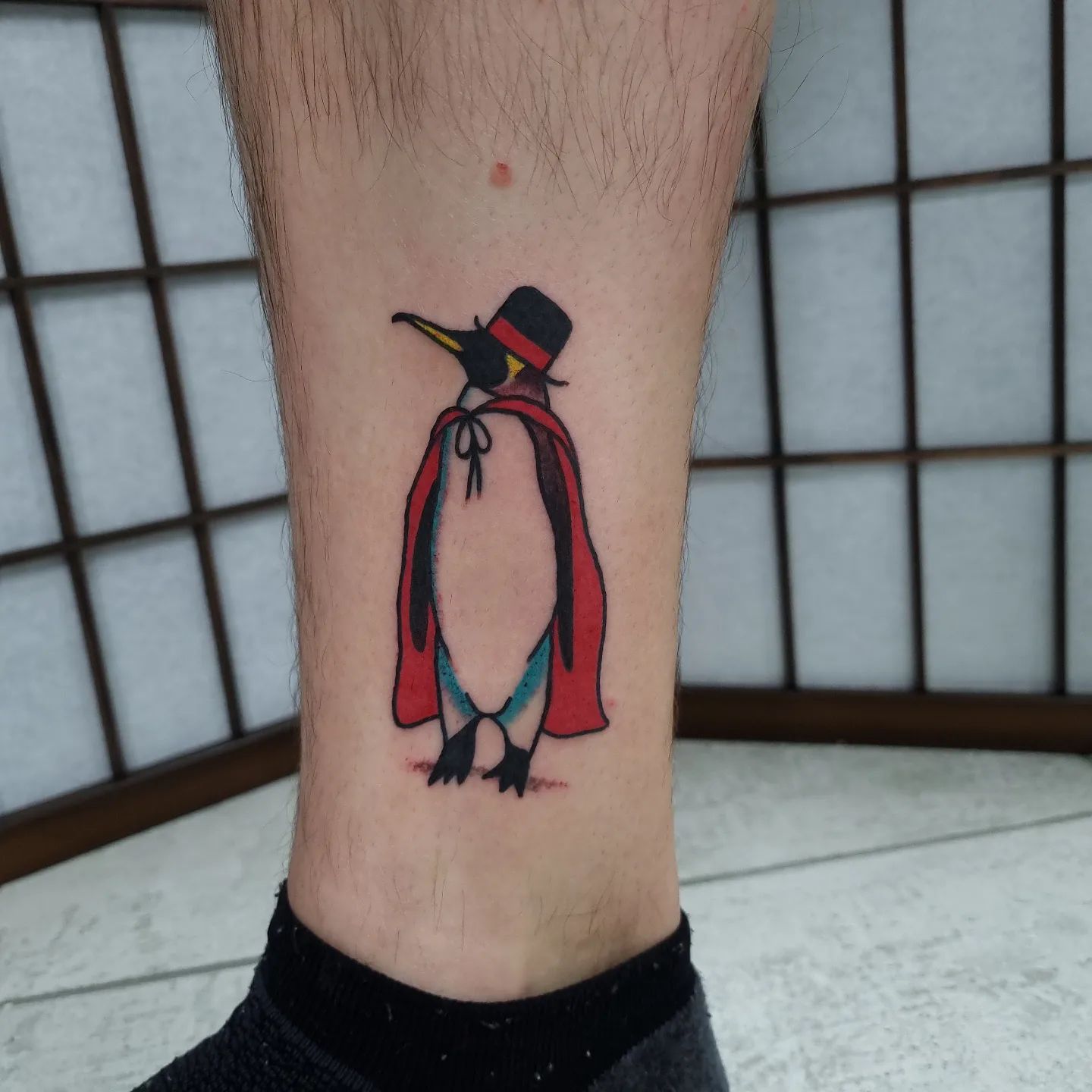 In order to have fun with your penguin tattoo, there are a lot of designs. How about a magician penguin? It sounds weird but just look at how cool it is.