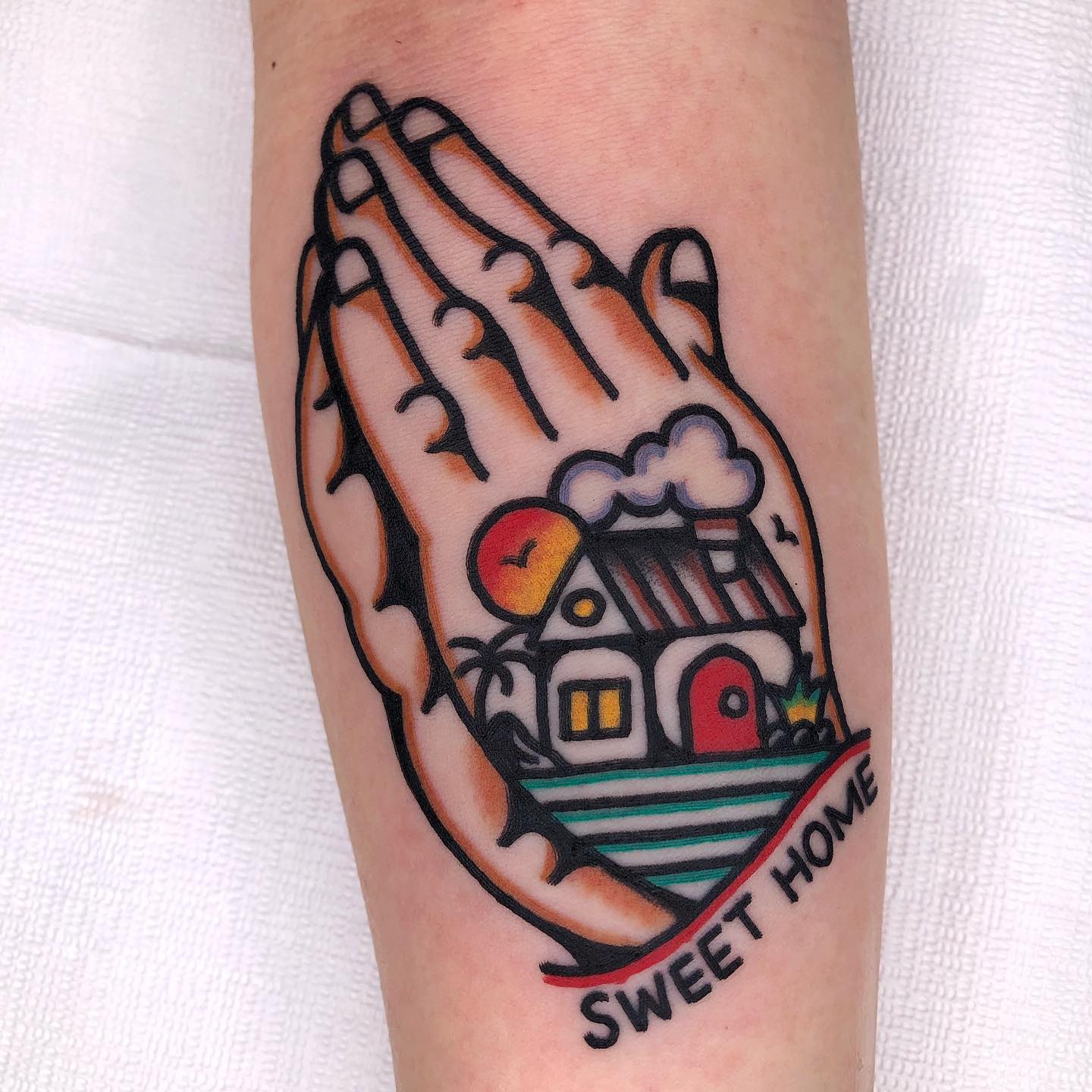  If you're fond of this kind of cartoonized tattoos, you should go for a tattoo like the one above. Home is where you feel safe, right? Your religion may be your home, too.