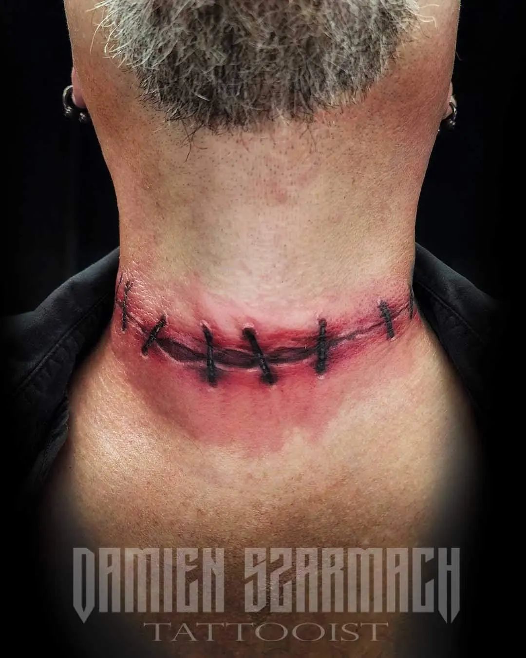 If you're fond of realistic-looking design like this tattoo, you're gonna love this design too. With this tattoo, people will think that you had undergone an operation. So keep it in mind that a tattooist can create this kind of tattoos that look realistic.