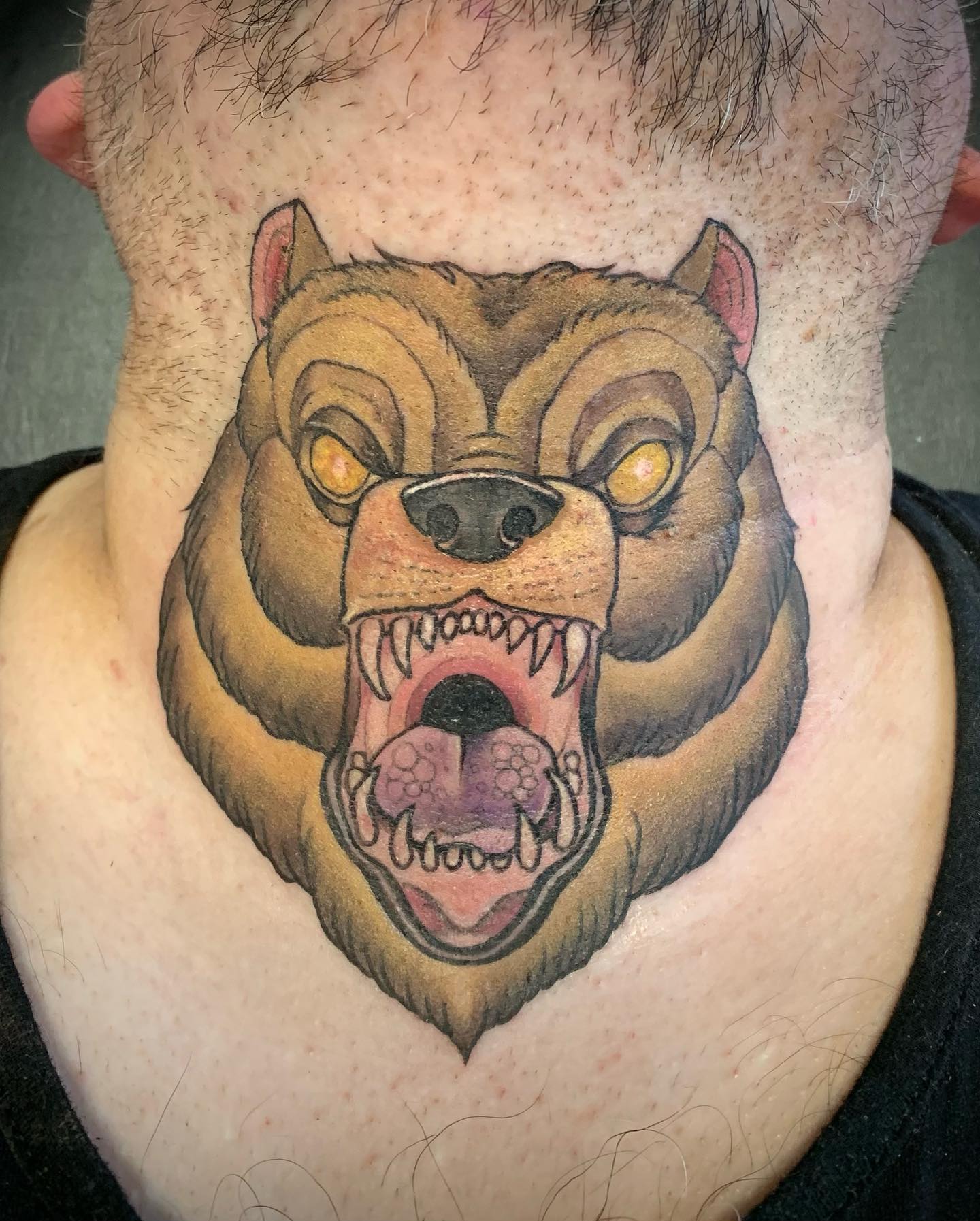 Colorful bear tattoo is for the ones who are fond of wild animals. Along with those yellow eyes and sharp teeth, this bear looks like a savage beast. It's not a big deal to get this tattoo since you know that you will stand out with it.