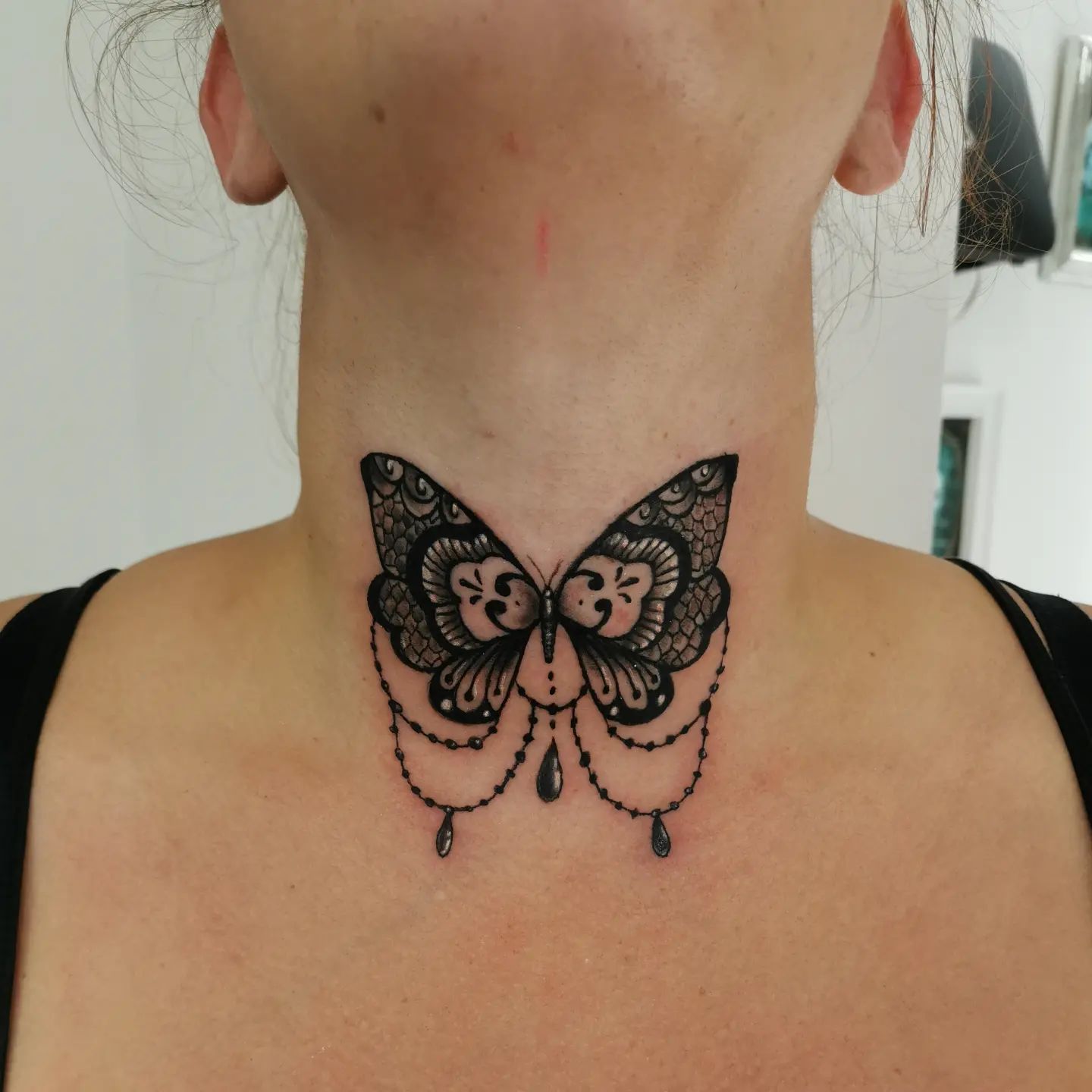 Why don't yoy try an elegant piece of butterfly tattoo on your throat? Even though this piece looks small, which could be the best choice for the ones who like minimal tattoo, it consists of many small but hard-to-make details as can be seen in wings of the butterfly.