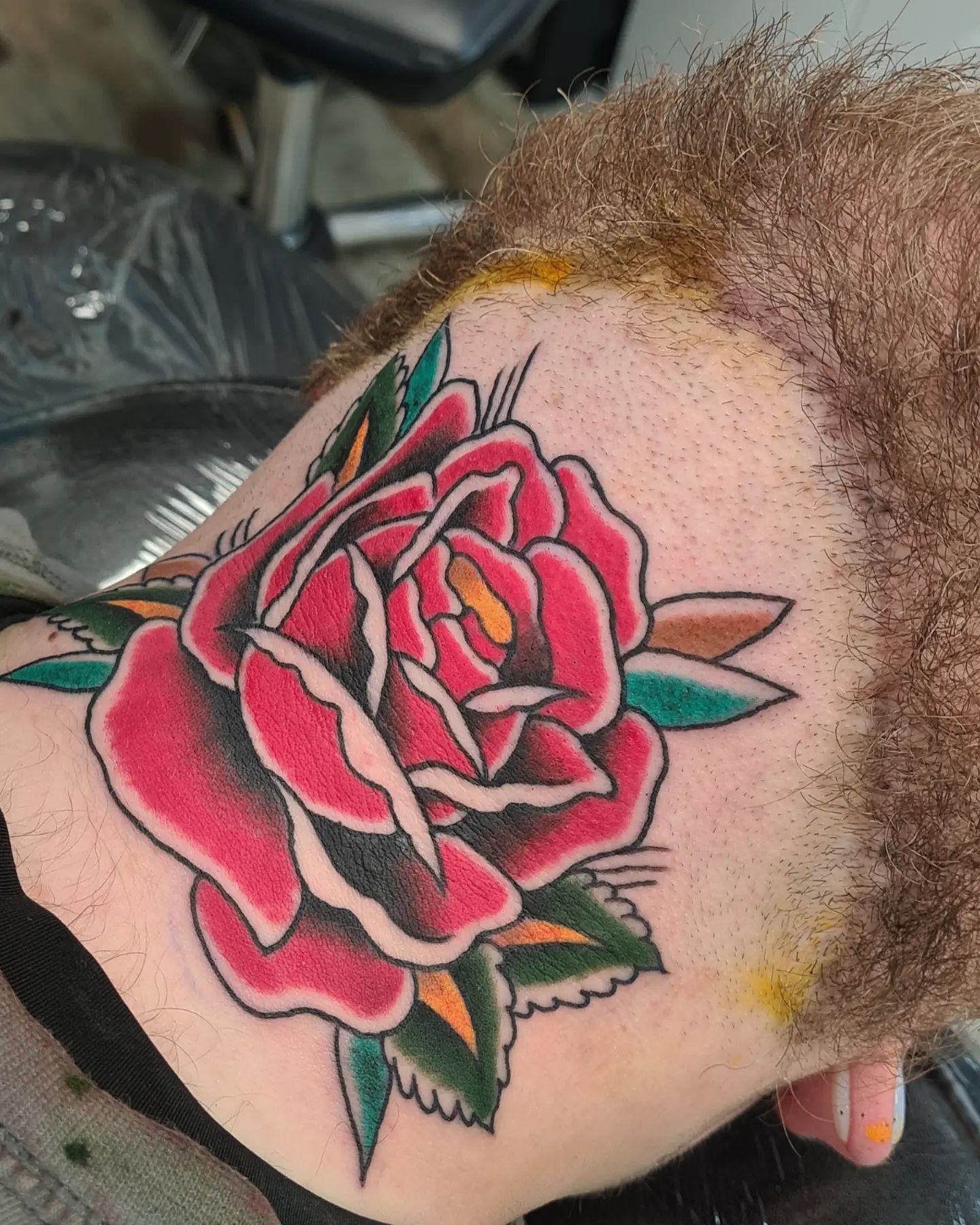 An old school rose design that is nicely done by competent artist rocks. The color palette and lines make this tattoo a nice piece. Without doubt, this tattoo will stand out on your throat.