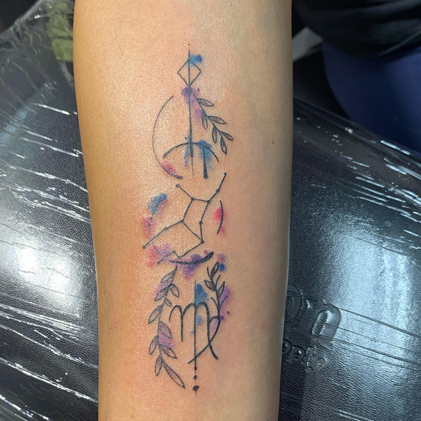 Every design you can imagine about Virgo tattoo is here. Your sign, constellation mark and a virgo are packed in just one tattoo. Watercolor effect adds an extra beauty to it.