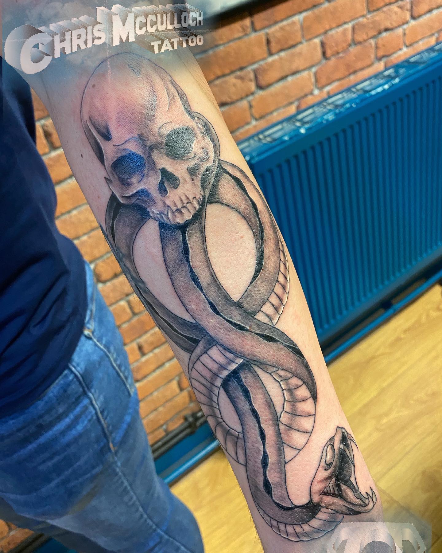 Blackwork death eater tattoo is a great choice for those who want a tattoo that stands out. The blackwork style is characterized by a small amount of shading, which makes the tattoo look bold and dramatic.