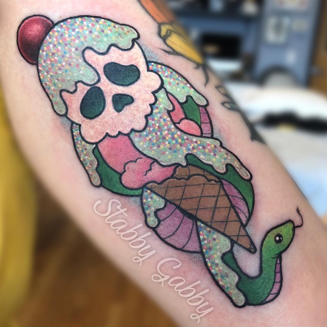 Everyone gets a tattoo of a classic Death Eater but you wanna try something creative, right? Then, this one is for you. Death Eater ice cream tattoo is an interesting way to show your love for Harry Potter, and it's a great way for you to make people smile.