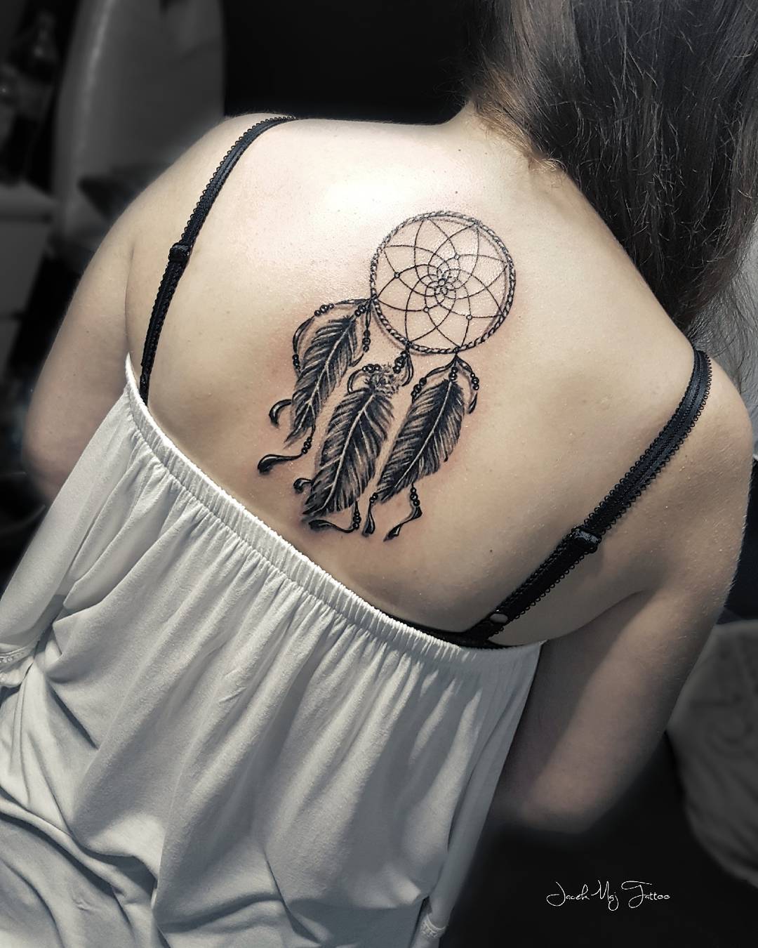 What's a classic dream catcher tattoo? Well, it's basically just a regular dream catcher, but with the addition of feathers and beads. Sometimes the beauty is in simplicity, so go for it.