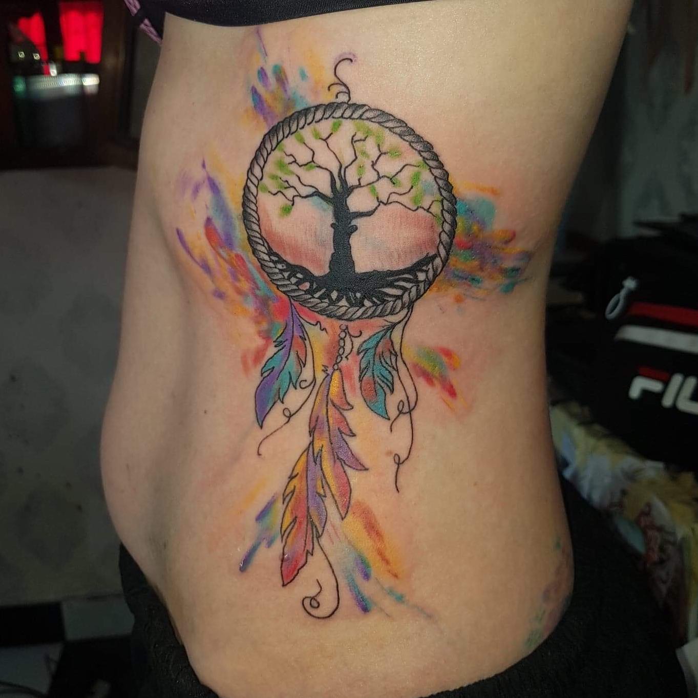 A tree of life tattoo is a symbol that represents a person's connection to their family, friends and ancestors. It can also be used as a way to celebrate the natural world and all of its beauty. As a creative tattoo, tree of life with a dream catcher looks amazing!
