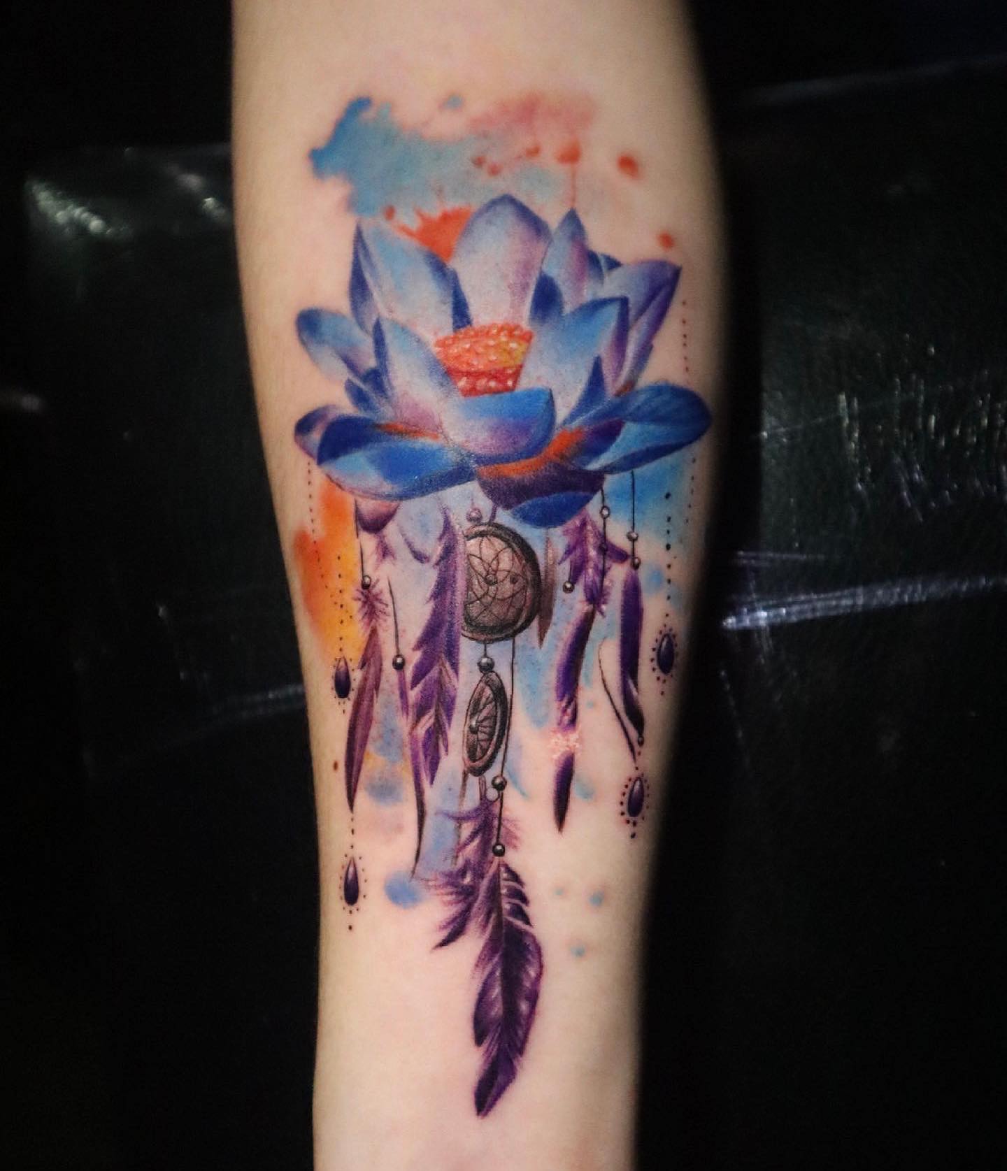 The lotus flower is a symbol of spiritual awakening and enlightenment. Thus, a lotus dream catcher tattoo is a tattoo that symbolizes the awakening of one's spirituality, or a journey to find it. Wanna get this fabulous tattoo? Let's do it as soon as possible.