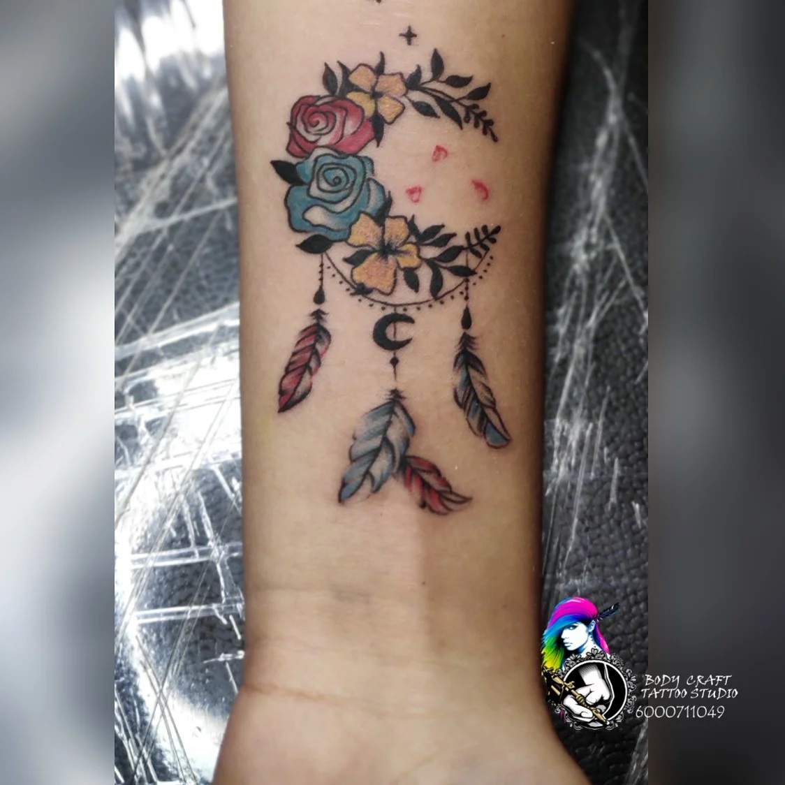 The floral dream catcher tattoo design can be interpreted in many ways, but the most common interpretation is that it represents the idea that dreams are like flowers—they grow from something small into something beautiful, and they can be shared with others.