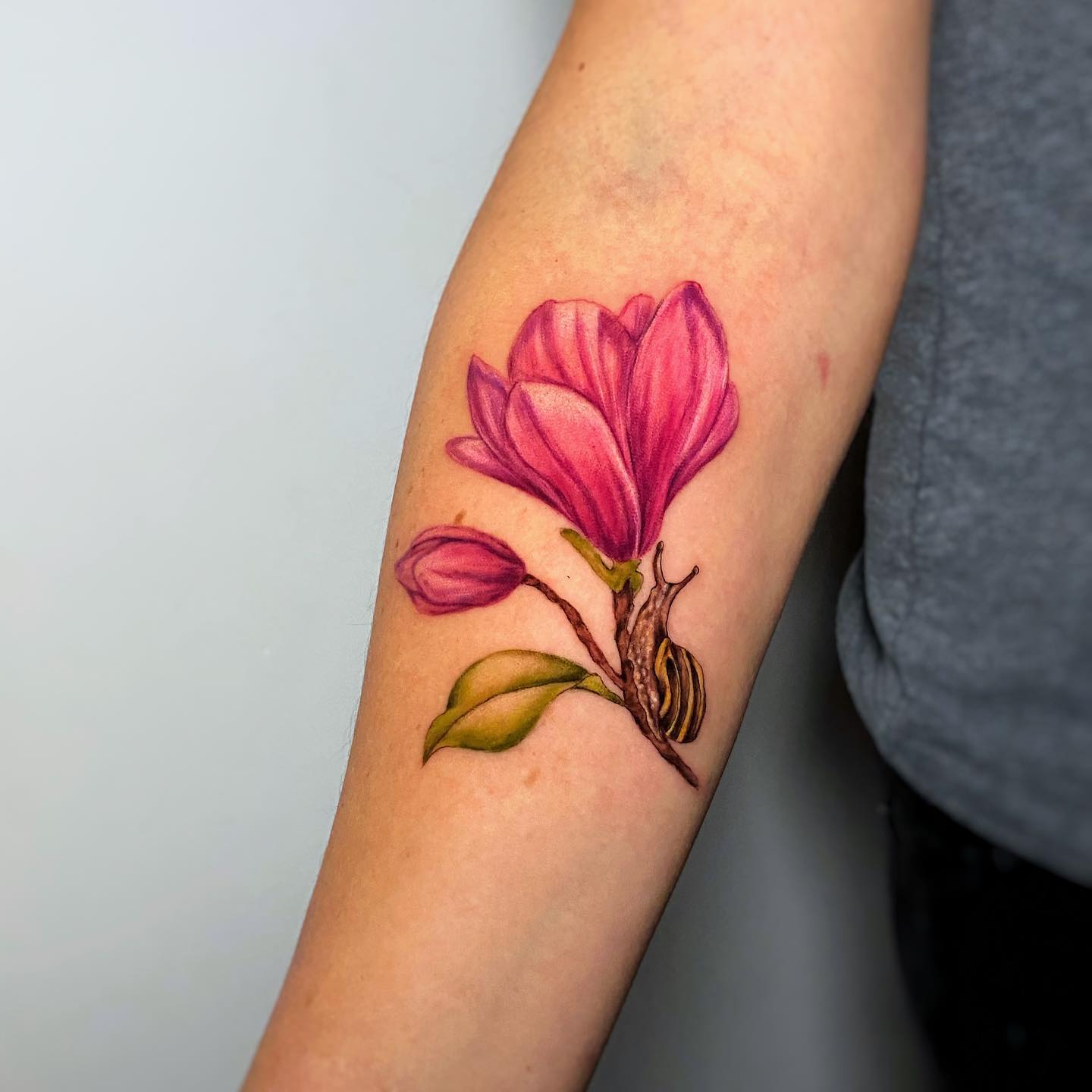 Being a symbol of hope, love and light, pink lily tattoos are just fabulous. Why don't you get a tattoo of it on your arm to feel its innocence and elegance?