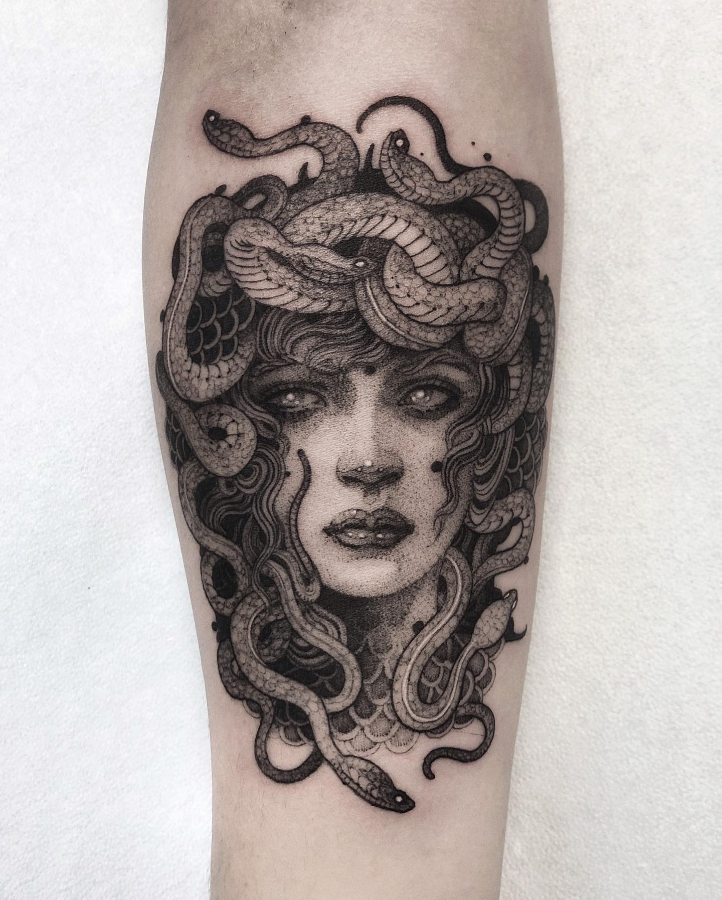 Covering up half of your arm may sound like something that takes a lot of courage but with this tattoo, it is quite easy. The reason is that it is a flawless work. This blackwork Medusa will take your tattoo to a different level.