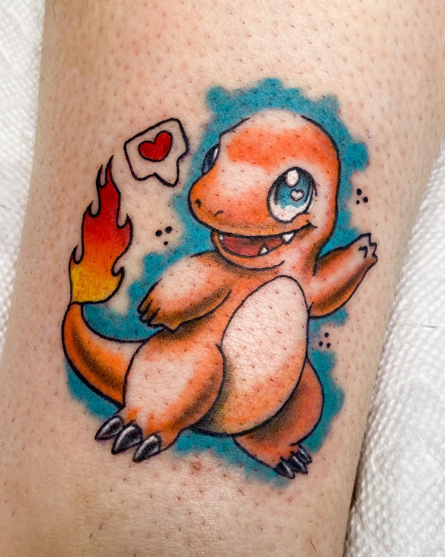 Charmander is a fire-type Pokémon that evolves into Charmeleon. It's the first Pokémon Ash ever caught, and it's one of his most prized Pokémon. The Charmander tattoo represents your love for the Pokémon and its evolution.