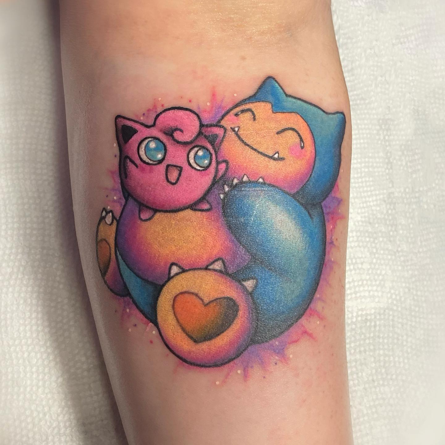One Pokemon character is enough to make you get happy but what about two? Combining two Pokémon characters in just one title design is a great idea. And the best part about this tattoo is that the characters are hugging each other.