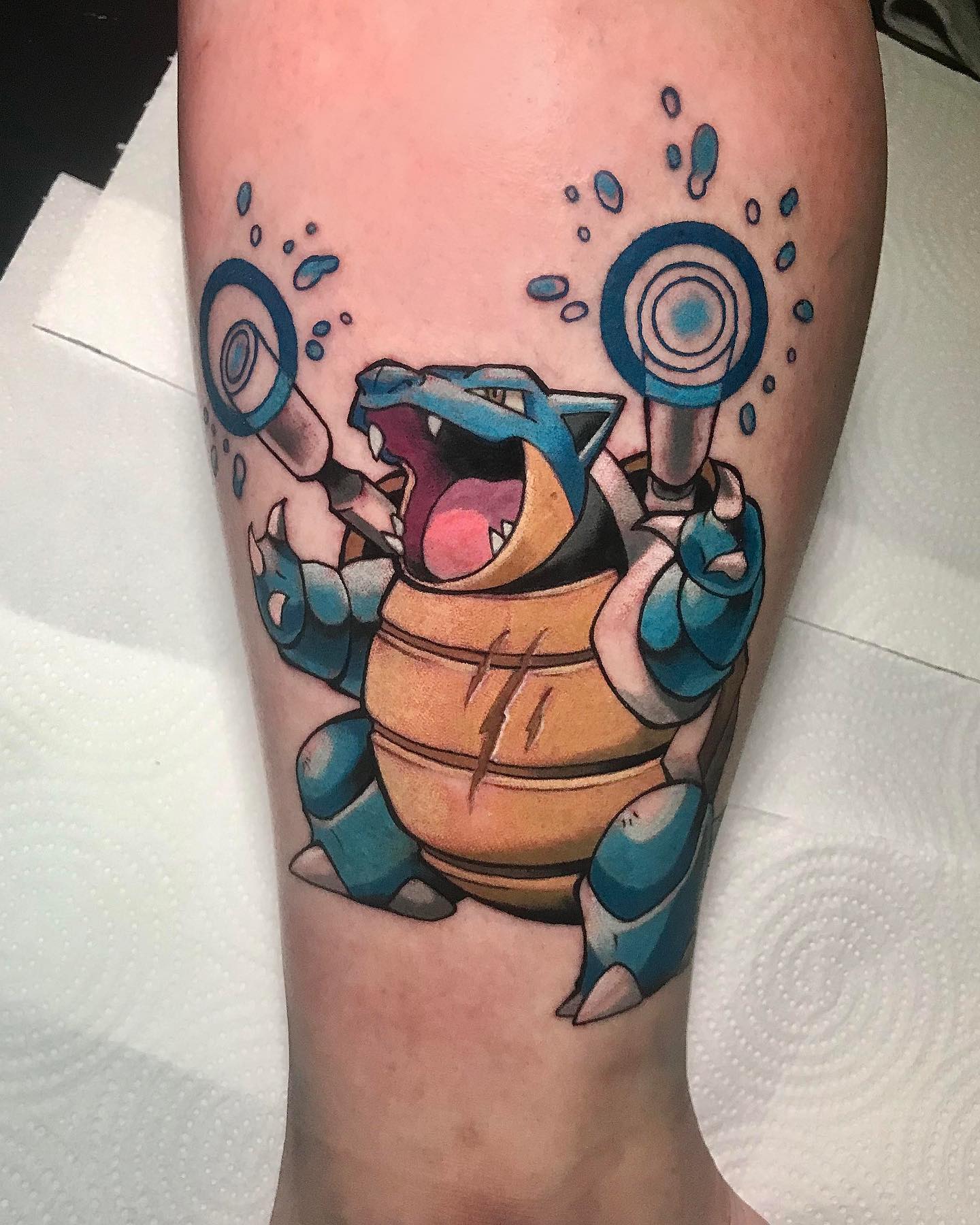 Many people choose to get a tattoo of Blastoise as a way to pay homage to their favorite Pokemon, or because they like how it looks on other people's bodies. Why don't you get a tortoise-like creature with a shell on its back?