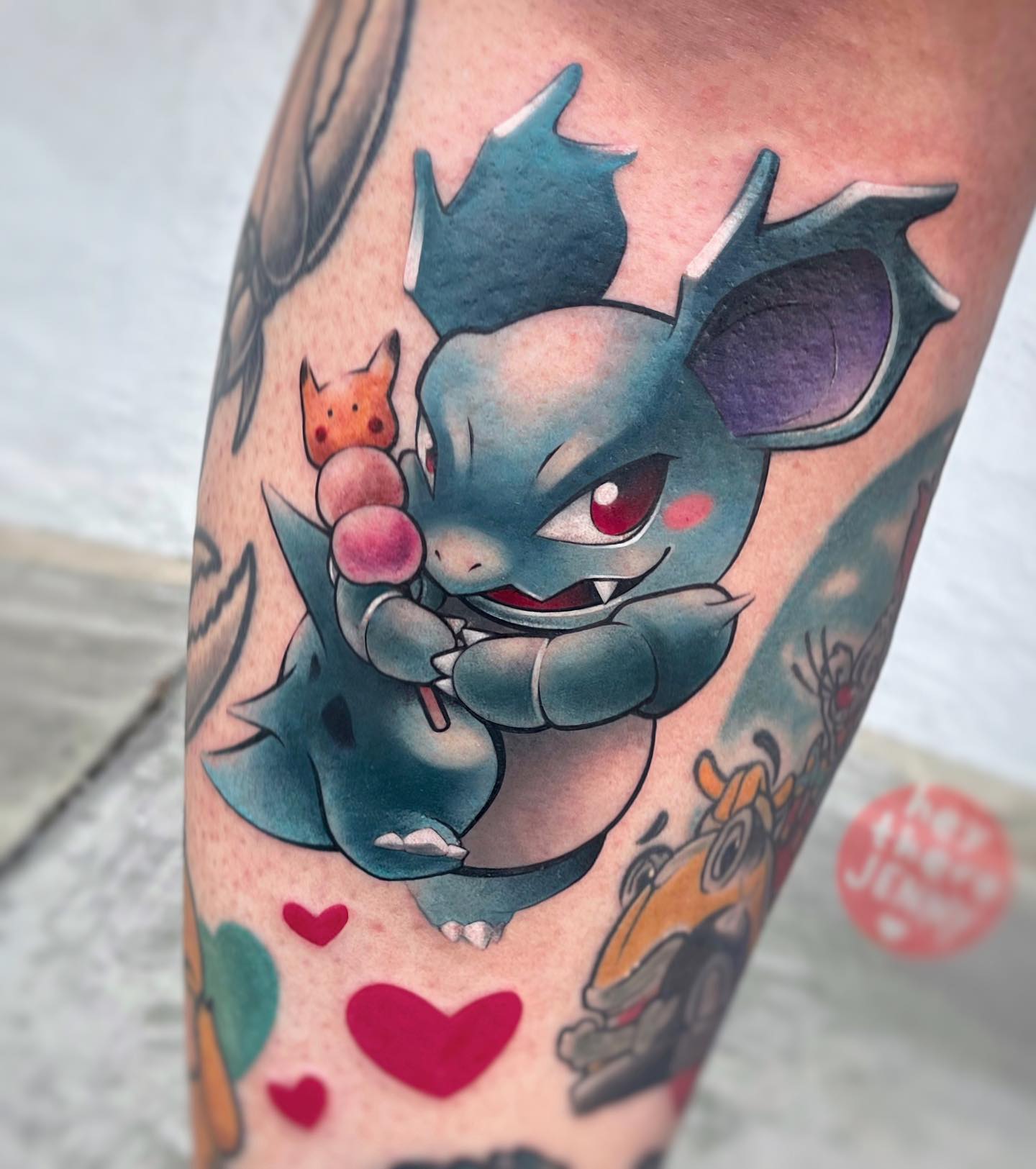 Nidorina is a Pokemon that first appeared in the second generation of video games, back in 1996. It's one of the few Pokemon that can evolve into multiple other Pokemon. Give it a shot for your next tattoo.