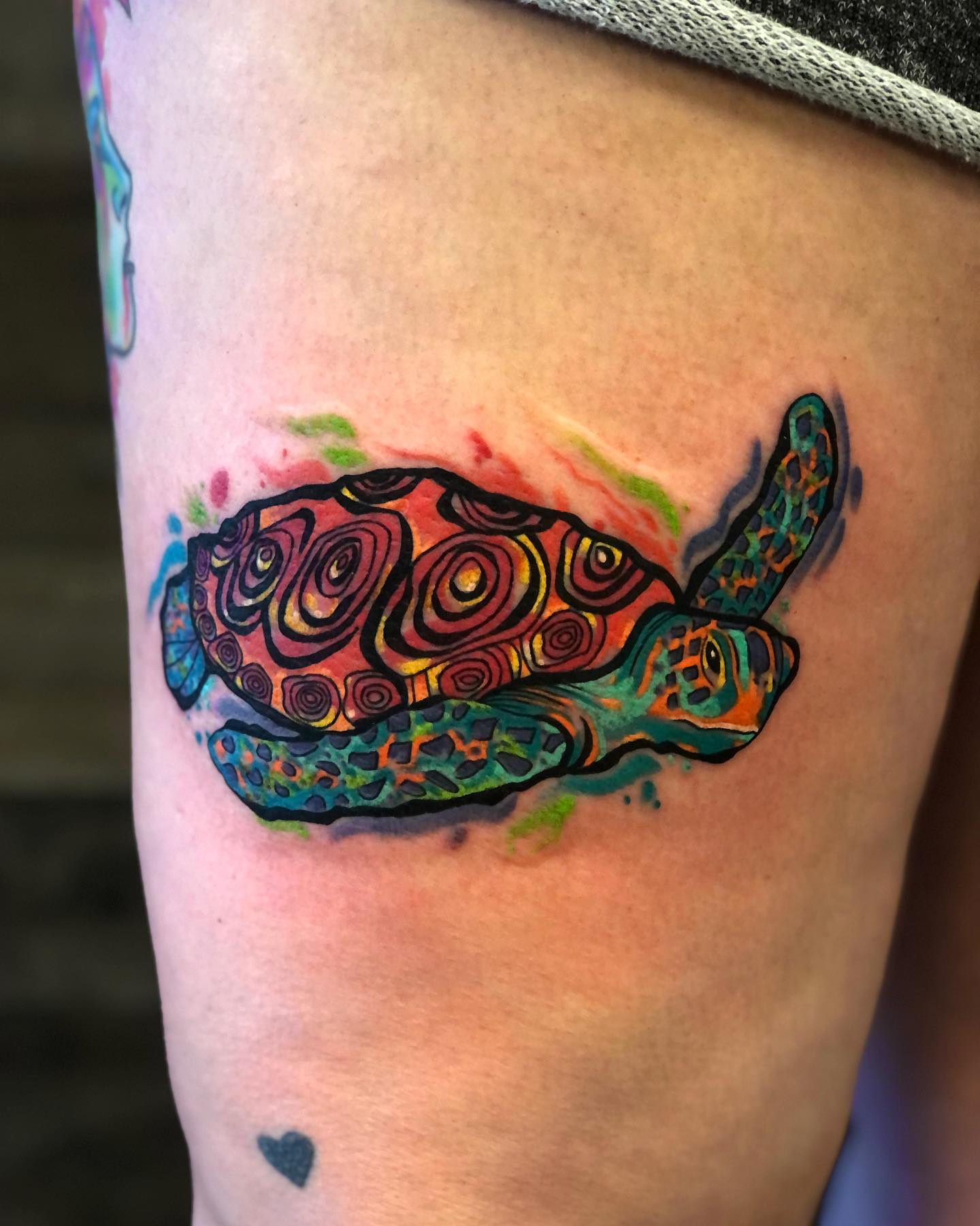 Wanna represent your love of the sea and marine biology, a colorful sea turtle tattoo is definitely for you! Get a tattoo like the one above on your upper leg to look amazing!