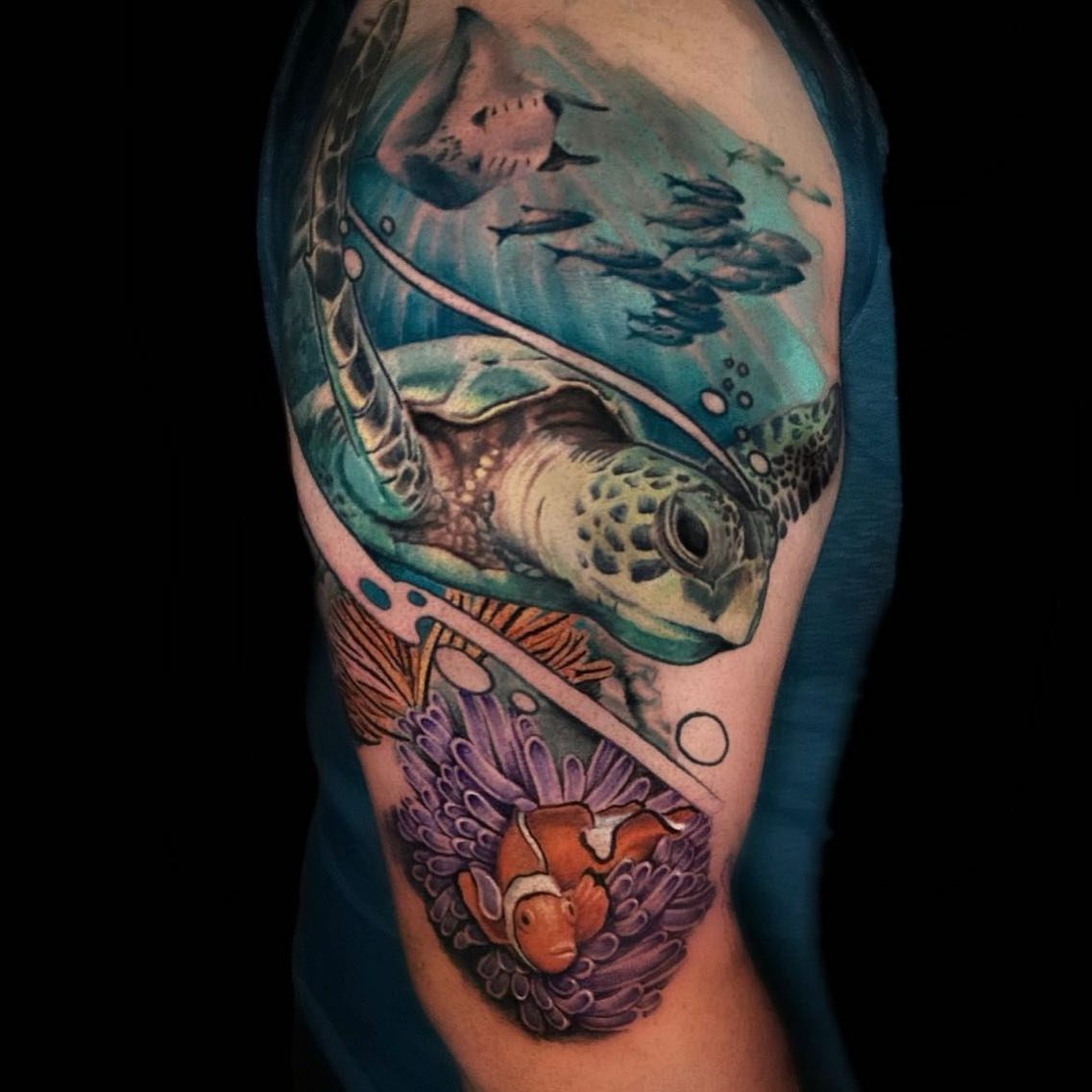 The ocean is such a magical and beautiful place on earth. That's why, it's great to pay tribute to that by getting a tattoo of some sea animals or plants. In the design above, the sea turtle is on the foreground. Let's have fun with it!