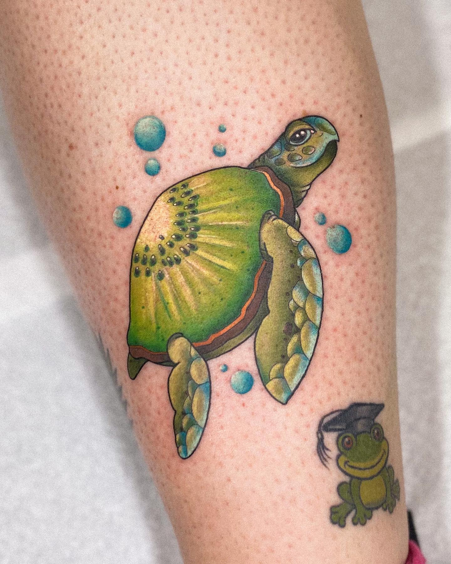 It's cool to see how different people interpret their tattoos differently. In this one, sea turtle's shell is interpreted as a kiwi. If you like creative tattoos, try it out.