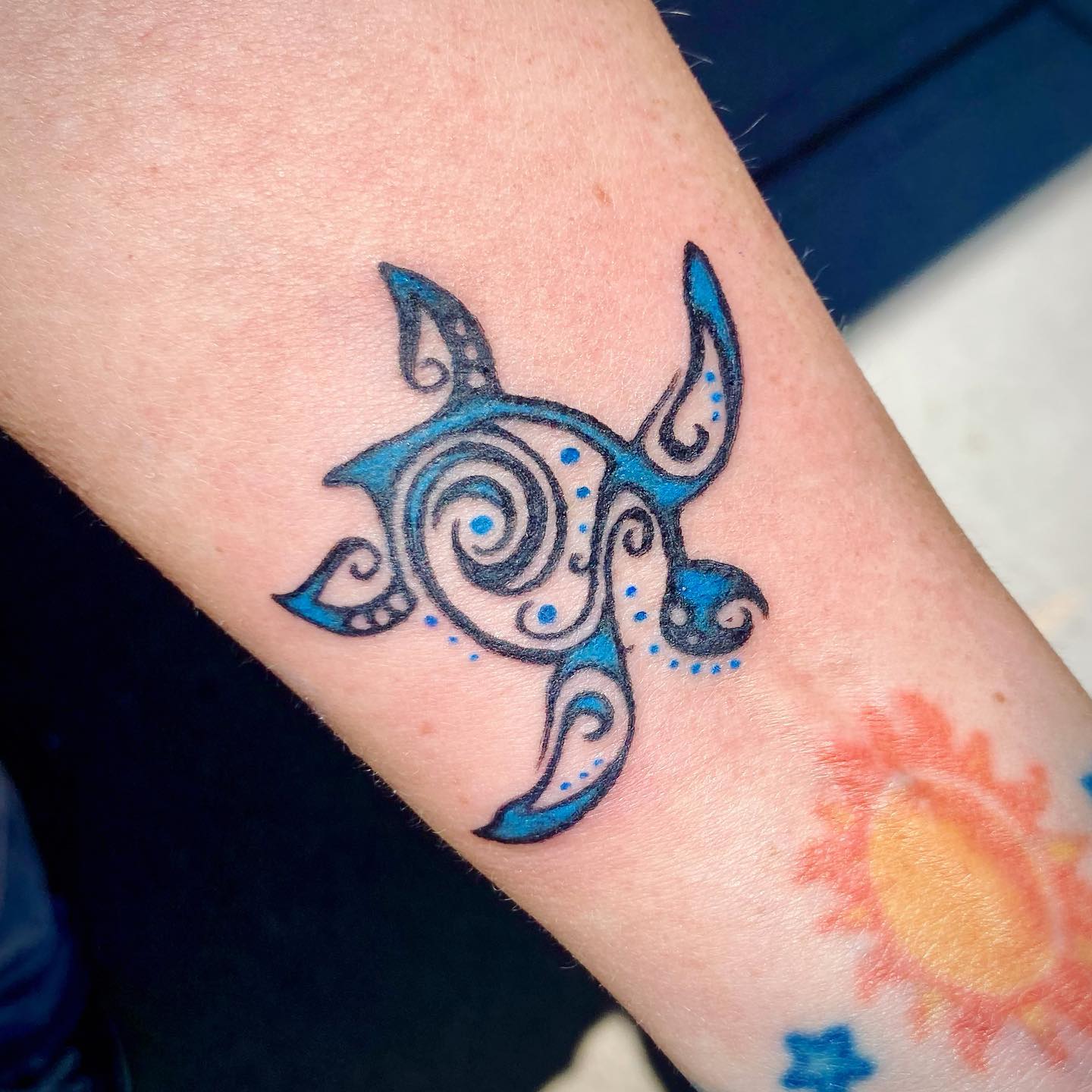 Can you spot the tribal elements that are incorporated into the sea turtle tattoo design? When combined with blue color, these elements create a look like waves in the water! Go and get it!