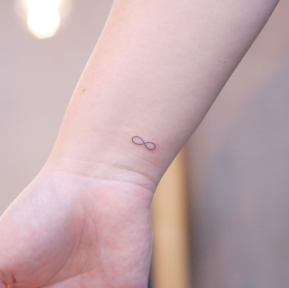 Small Infinity Wrist Tattoo  Tattoo Ideas and Designs  Tattoosai
