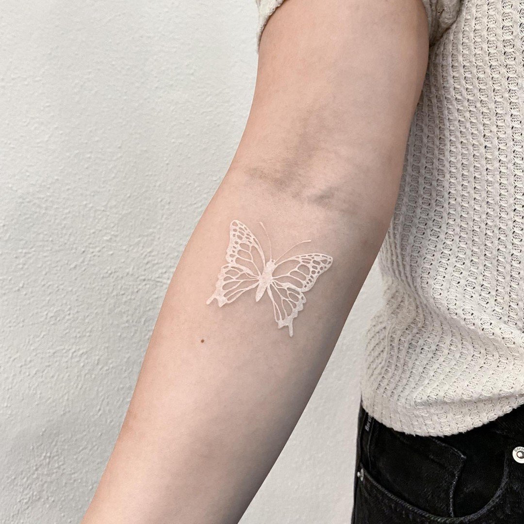 A butterfly tattoo is a popular choice for those who want to memorialize a loved one. It can also be a way to mark your transition into adulthood, or commemorate an important moment in your life. Go and get it white to make it better.