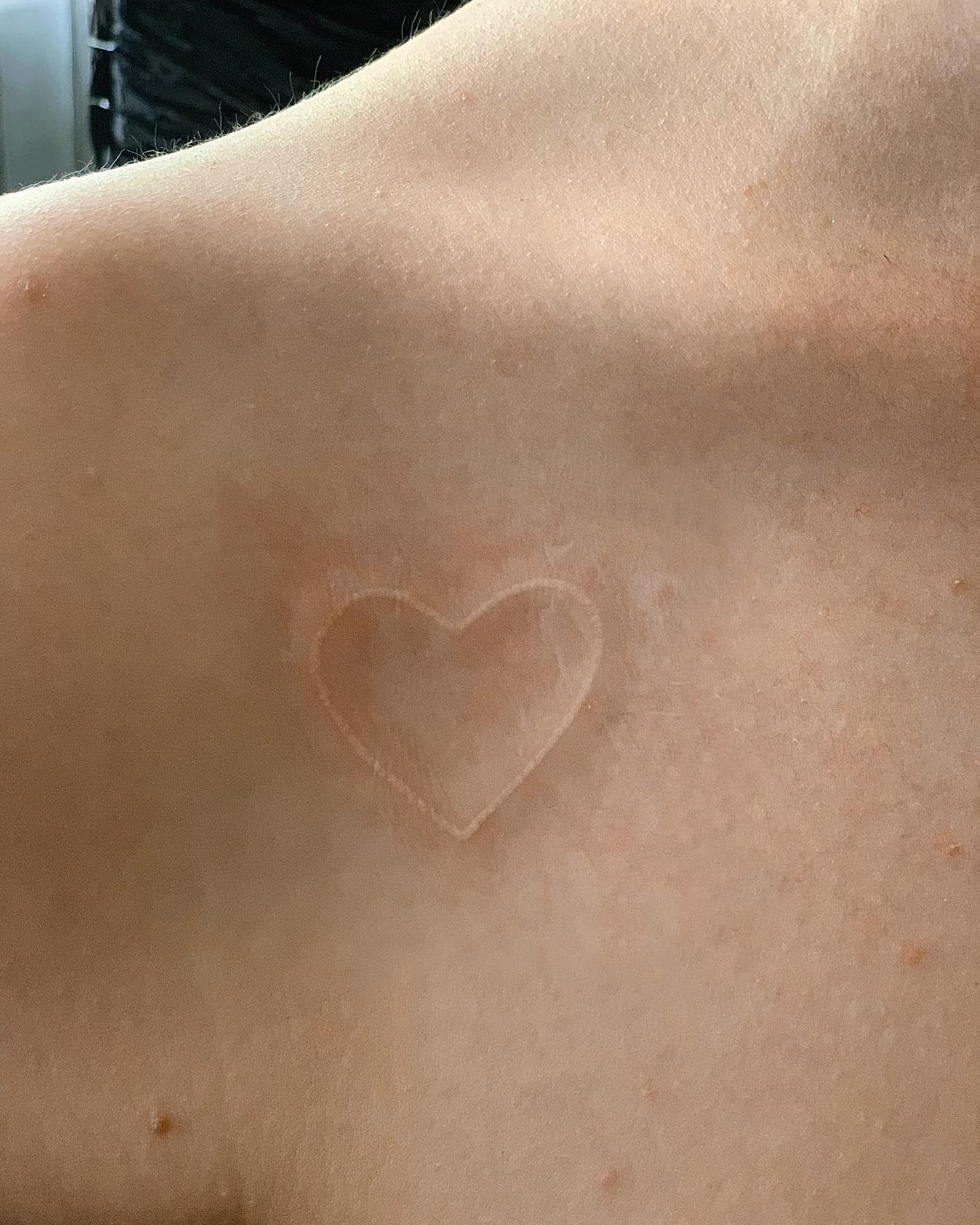 Wanna get a tattoo that is hard to recognize? White ink heart tattoo is for you then. The fact that it's white makes it stand out and gives it a cool contrast to the red of your blood when you get a tattoo. I also like that it's not as bold as other tattoos because it will fit into any outfit or style.