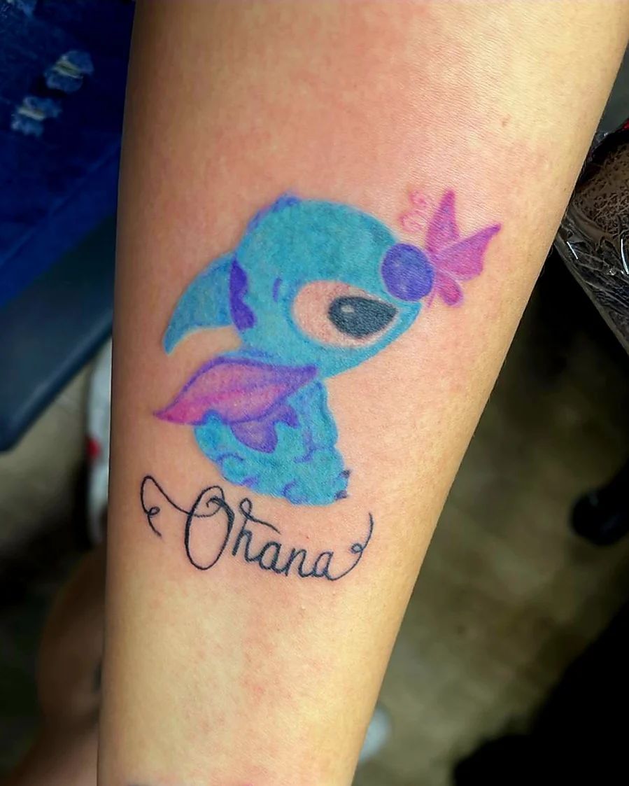 Classic Ink Tattoo Studio  Ohana means family  jbealstattoo did this  lovely watercolor Stitch tattoo tattoos watercolortattoo ink  watercolor stitch disney fl disneytattoo stitchtattoo 941 ohana  family tattoo pastels colortattoo 