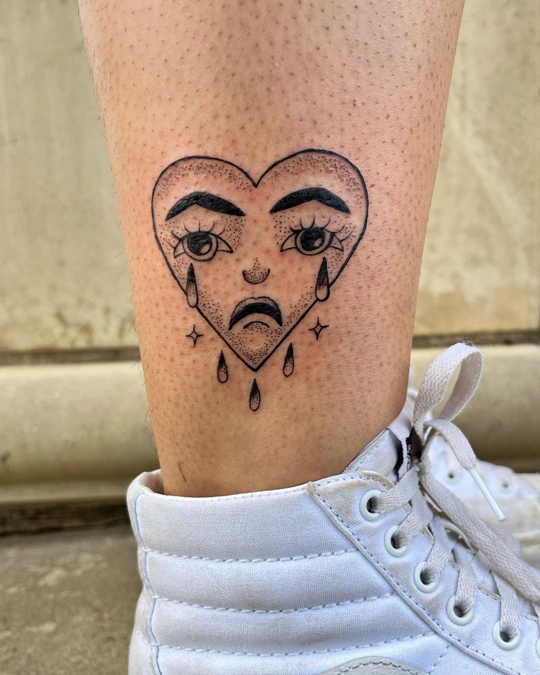 30 Crying Heart Tattoos Etching Emotions into Art  100 Tattoos